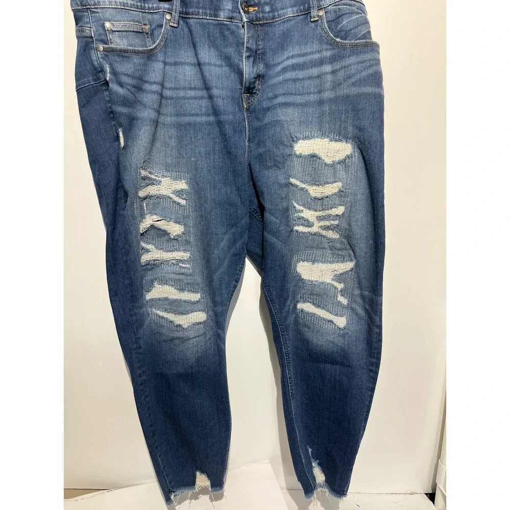 Torrid Bombshell Skinny Jeans 28R Medium Wash Distressed Ripped Raw Hem Blue